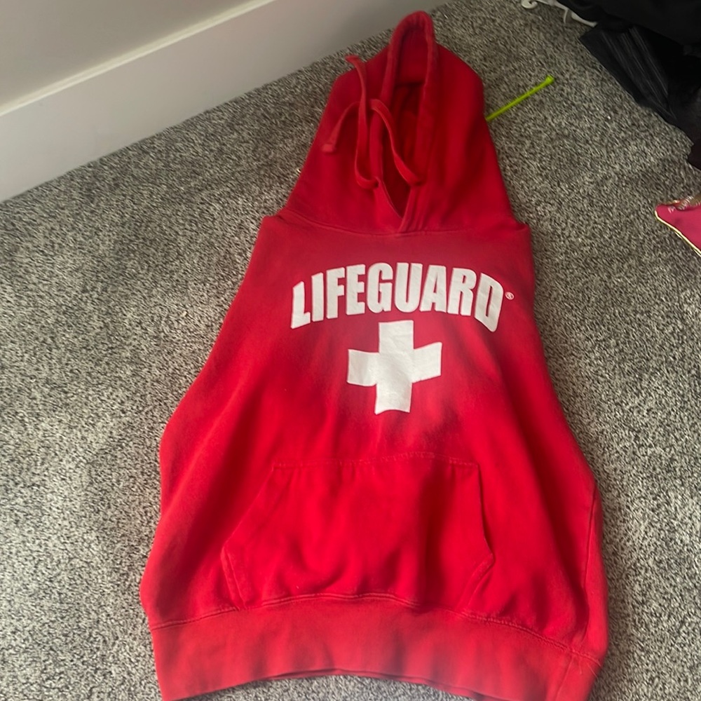 Im selling a red lifegaurd hoodie that is a small in womens.